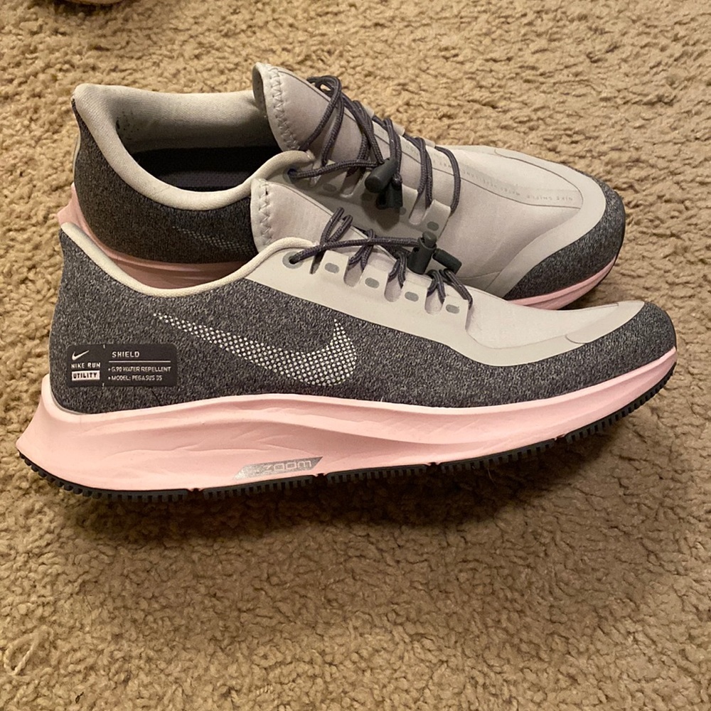 Pink and gray Nike Pegasus 35